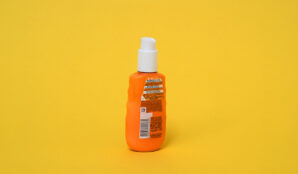 obal_od_opalovaciho_kremu_mleko_na_opalovani_recyklacni_symbol_plast_pet