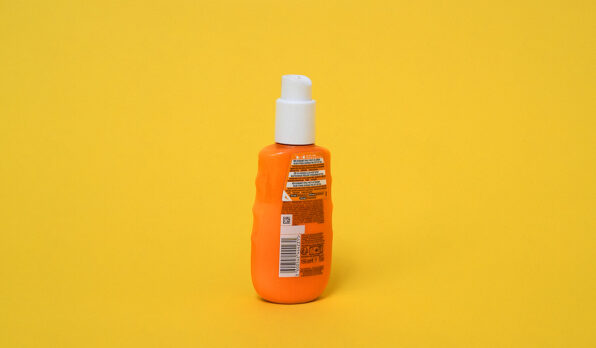 obal_od_opalovaciho_kremu_mleko_na_opalovani_recyklacni_symbol_plast_pet